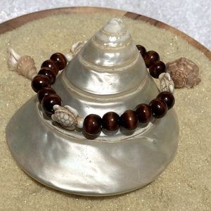 Beaded bracelet - wood and cream colored turquoise turtle beads